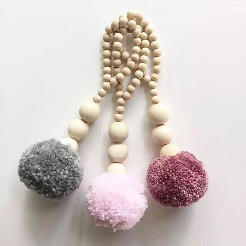 إكليل من الخرز الخشبي على الطر - مراجعة Baby Nursery Garland وسعره
